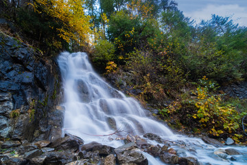 Waterfall in deep forest ,Forest waterfall,Small waterfall  in the autumn