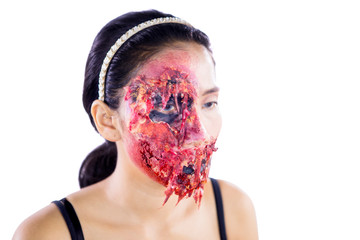 Woman with horrible wounds makeup on her face