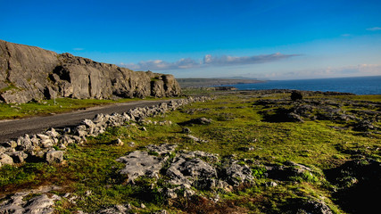 Road through Burren with cliffs County Clare Connacht Provice Ireland
