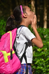 Naklejka premium Surprised Filipina Female Student Wearing School Uniform With Notebooks