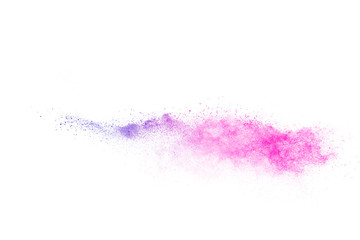 Freeze motion of purple color powder exploding on white background.