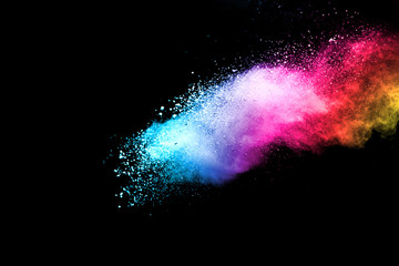 Explosion of colored powder isolated on black background. Abstract colored background. holi festival.