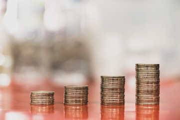 step of coins stacks, money, saving and investment or business planning concept.