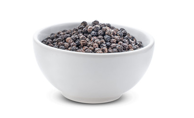 Black pepper on white background.
