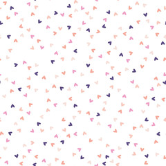 Seamless pattern with tiny pink and purple hearts