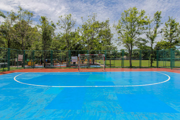  A football field in a natural park on a sunny day