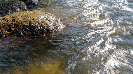 water flowing over rocks