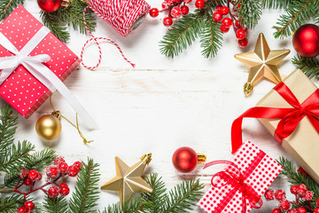 Fototapeta na wymiar Christmas background with fir tree, present box and decorations