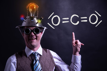 Nerd presenting handdrawn chemical formula of co2