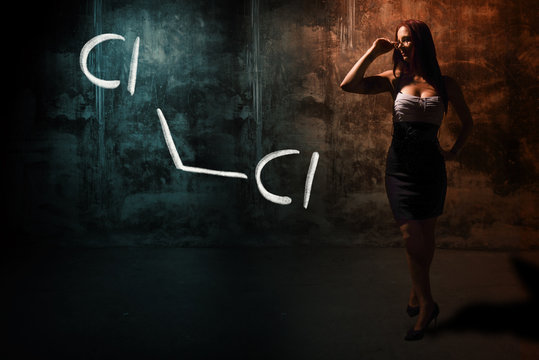 Sexy girl or secretary or female student presenting handdrawn chemical formula of dichloromethane