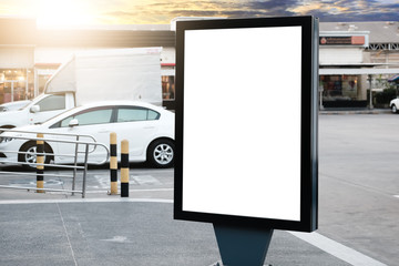 big blank billboard white LED screen vertical outstanding in the city on pathway side the road...