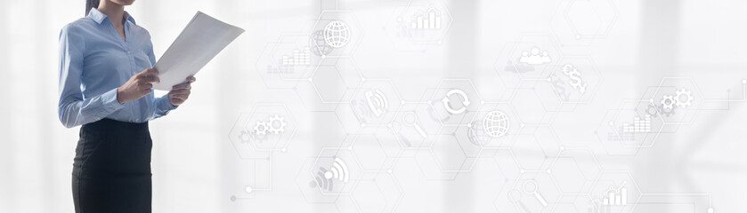 Diagrams and icons on hologram screen. Mixed Media Website Business Horizontal Background. girl with a sheet of paper