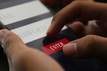 attractive hands writing sign username on a smart phone