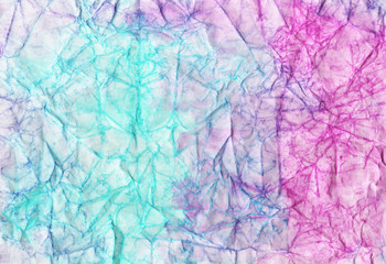 Blue, purple and pink crumpled paper. Wrinkled  background. Color abstract wallpaper. Colorful craft page.
