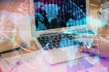 Multi exposure of businessman working on laptop on background. International business hologram in front. Concept of success.