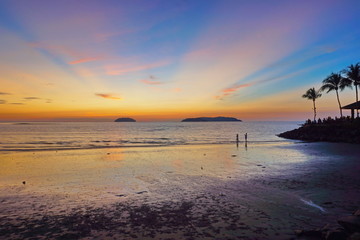 Colorful sunset with rays of light at beach