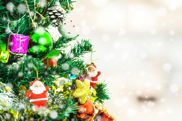 Tree and Christmas decorations. Beautiful decorated with present boxes in a winter landscape with snow. Can be used for background or wallpaper.