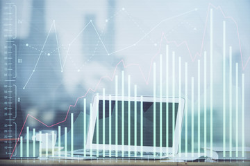 Stock market graph and table with computer background. Multi exposure. Concept of financial analysis.