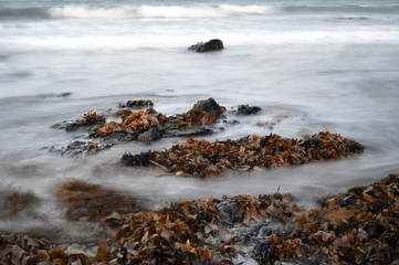 waves on beach long exposure 