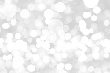 Abstract background with White bokeh on gray background. christmas blurred beautiful shiny Christmas lights.