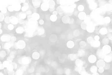 Abstract background with White bokeh on gray background. christmas blurred beautiful shiny Christmas lights.