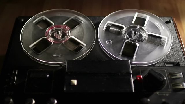 Old retro Reel Audio Recorder reels spinning