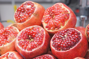 Pomegranate fruits is displayed for sale in the market.. Peeled to make it easier for customers to choose.