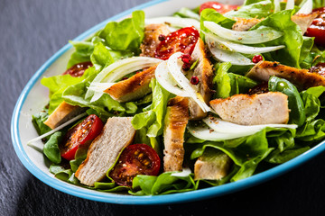 Caesar salad on stone table
