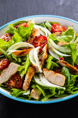 Caesar salad on stone table