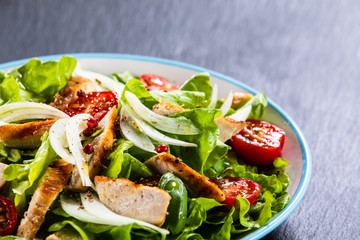 Caesar salad on stone table