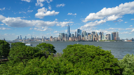 New York, NY, USA. Amazing skyline of Manhattan skyscrapers and buildings from Ellis Island....