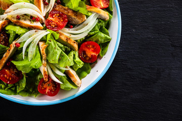 Caesar salad on stone table