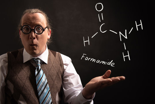 Professor presenting handdrawn chemical formula of Formamide