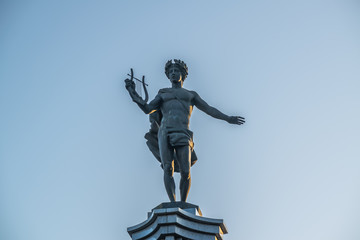 Column of Apollo during summer evenng in the theatrical square of the city of Krasnoyarsk, Russia