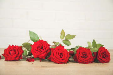 red roses on desk