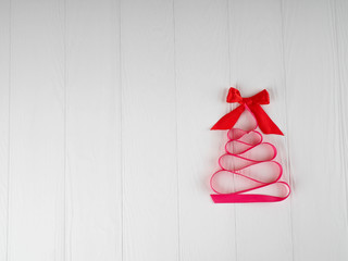 Christmas tree satin pink ribbon, on white background, copy space, holiday, Christmas, next Christmas gift