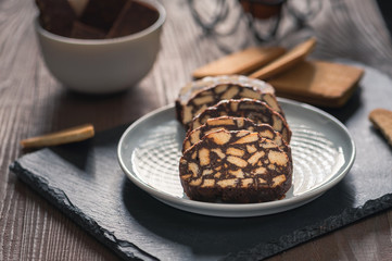 Chocolate sausage on a dark background