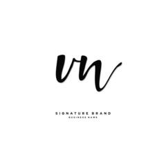 Fototapeta na wymiar V N VN Initial letter handwriting and signature logo concept design.
