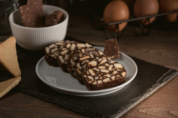 Chocolate sausage on a dark background