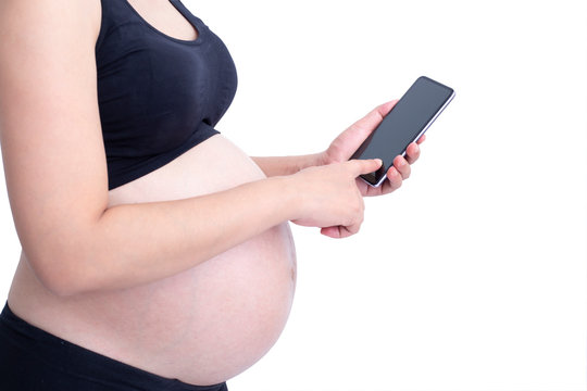 Pregnant woman using smartphone isolated on white background
