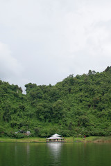 Fototapeta na wymiar White house on the lake Calderas, Guatemala