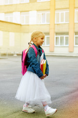 Portrait of a little girl going to school