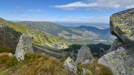 Mountain landscape from hill Chopok in the ski resort Jasna, Low Tatras, Slovakia. High Tatras in the background.