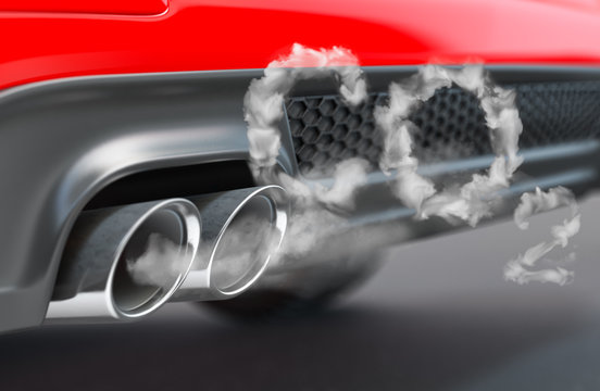 Car pipe with co2 carbon dioxide emissions. Combustion fumes coming out of car exhaust pipe.