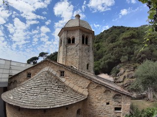 Portofino, Italy - 08/29/2019: Beautiful bay with colorful houses in Portofino in sumer days. Hiking around the ligurian mountains.