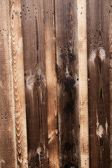 Wood texture. Old brown wooden painted surface for background. Natural aged wooden texture with cracks. Close up. Natural tree texture.