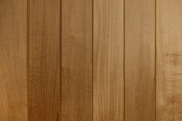 Texture of a wooden surface from several brown boards