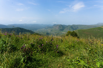 Gumbashi pass view in the russian caucasus, green meadow landscape at an altitude of above 2000 m
