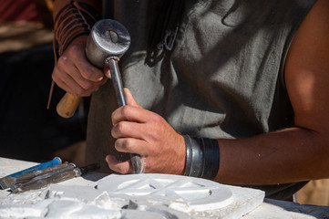 Chisel for sculpting stone, artistic work