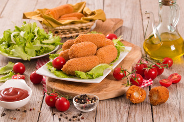 Supplì, italian fried rice balls.